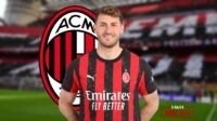 Gimenez pemain Milan dengan seragam merah hitam di stadion.